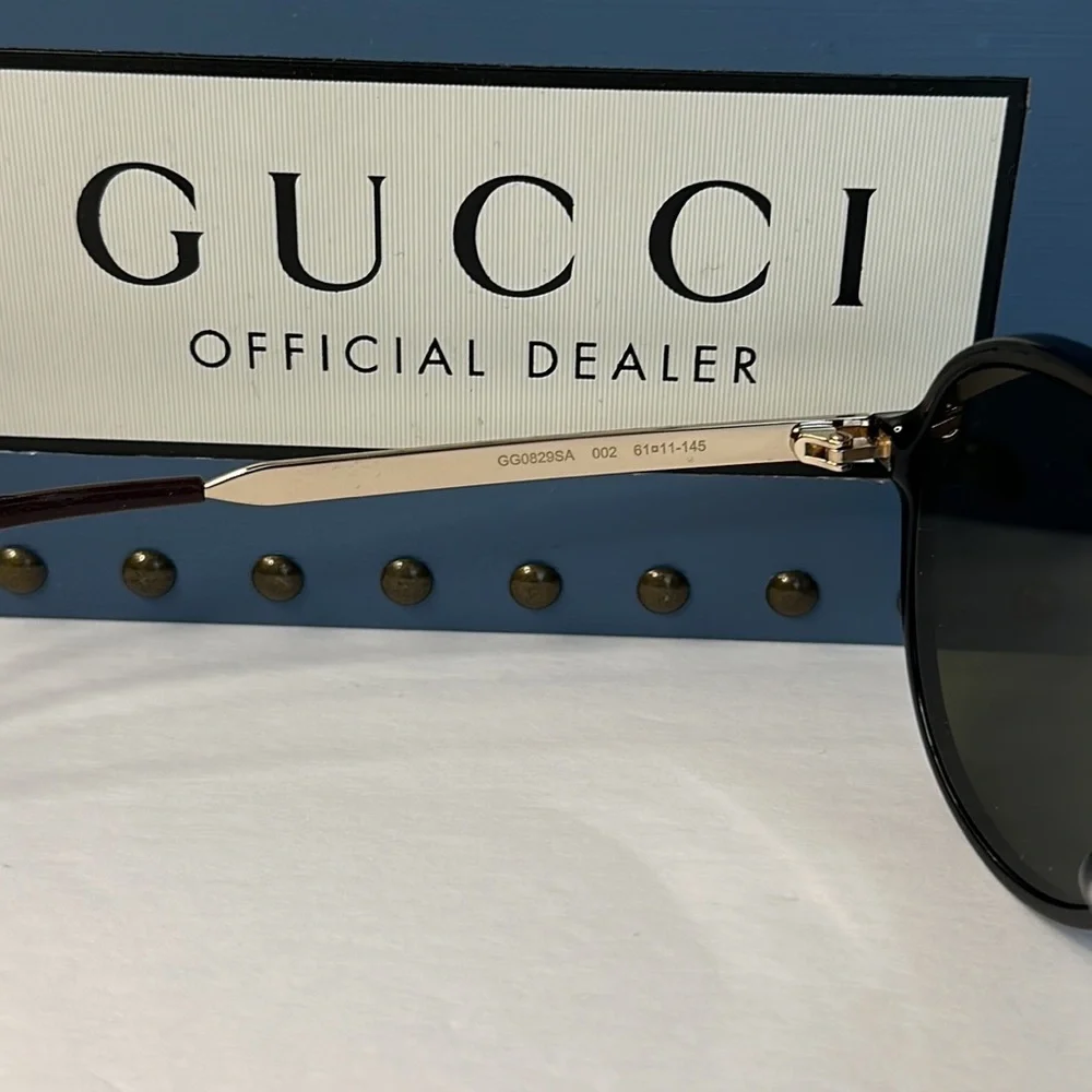 GUCCI GG0829SA 002 aviator sunglass black and ruthenium frame with green lenses.